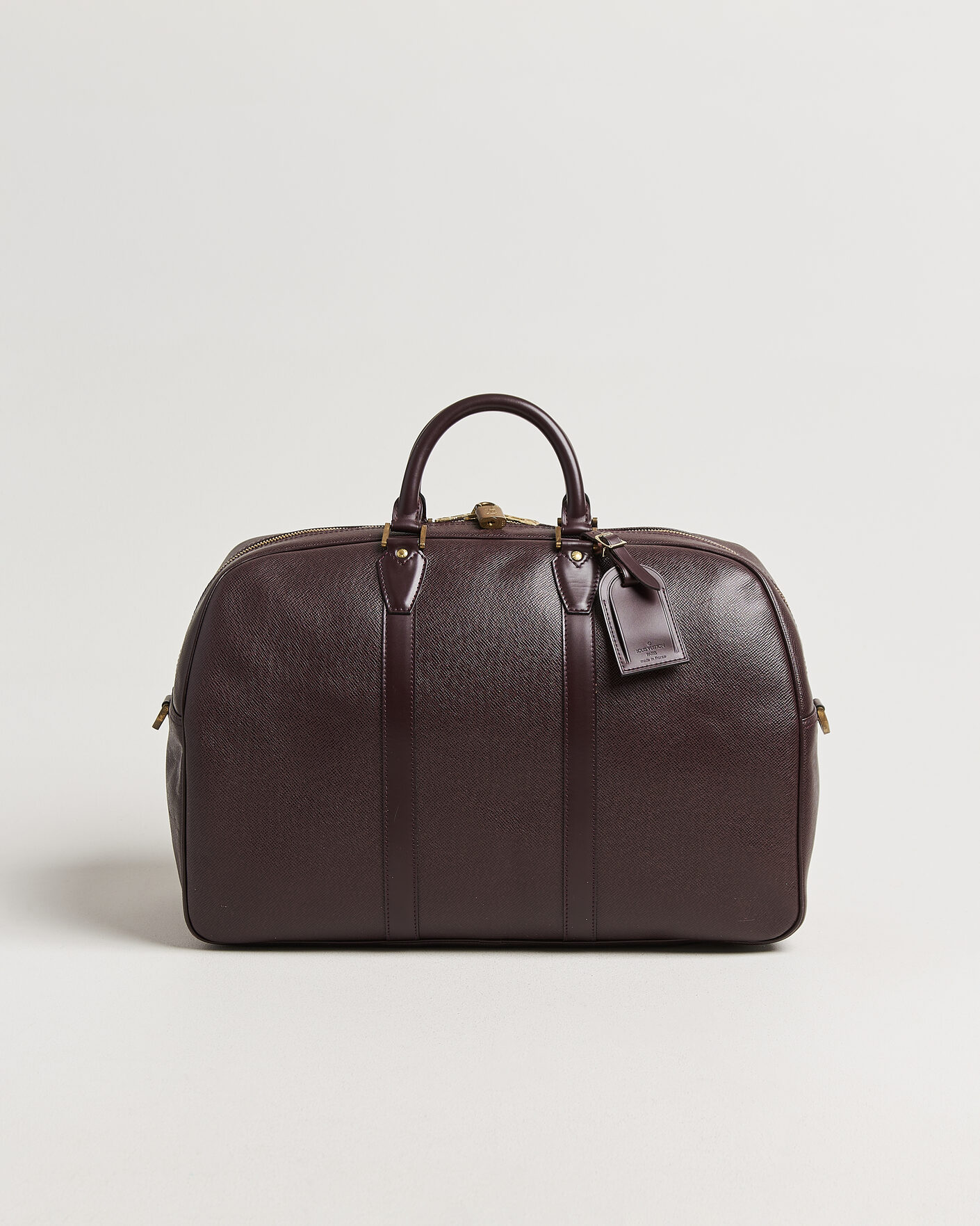 Homme | Pre-Owned & Vintage Bags | Louis Vuitton Pre-Owned | Taiga Kendall Weekend Bag PM Burgundy