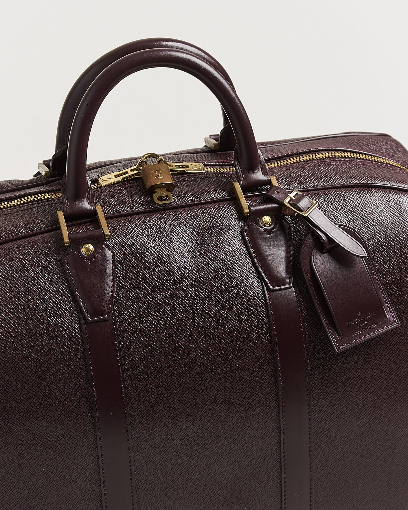 Homme | Pre-Owned & Vintage Bags | Louis Vuitton Pre-Owned | Taiga Kendall Weekend Bag PM Burgundy